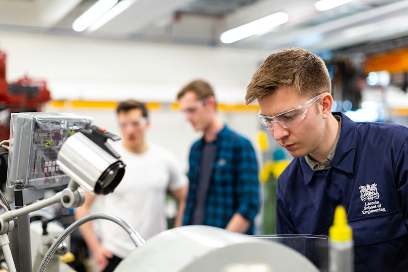 Engineer checking vibratory equipment specs